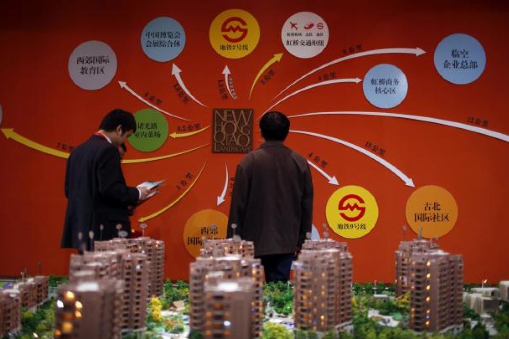 Shares in property firms Country Garden, Fantasia and Powerlong Real Estate were all up yesterday as the firms announced plans to increase their sales in 2013. Photo: Reuters