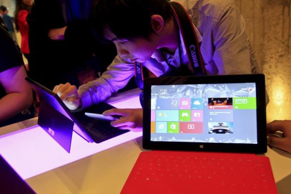 Microsoft is now selling tablets and Windows-based personal computers and smartphones via Tmall.com. Photo: AP