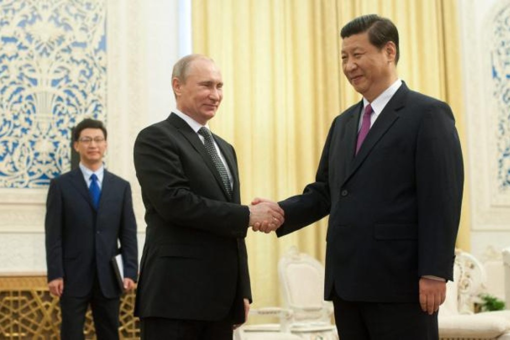 Xi Jinping (right) held an official meeting with Russian President Vladimir Putin in Beijing last year as vice-president. Xi will meet him again this week, but as president. Photo: EPA