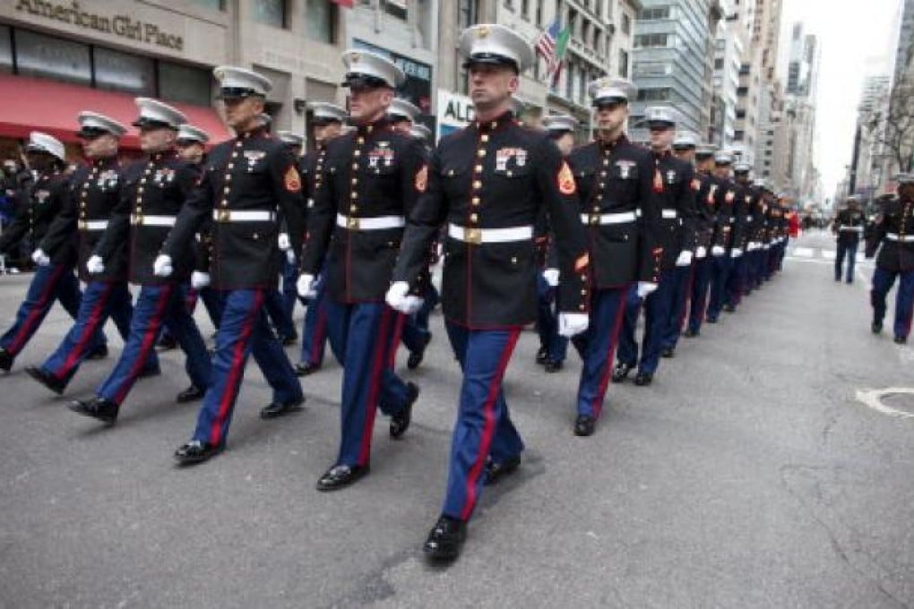 US marines in dress uniform. Seven US Marines were killed and eight others wounded when a mortar round exploded while still in its launch tube during a training exercise. Photo: AFP