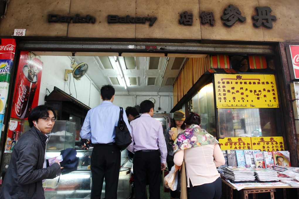 Hungry shoppers queue at the Danish Bakery in Causeway Bay after news got out that the property had been sold. Photo: Dickson Lee