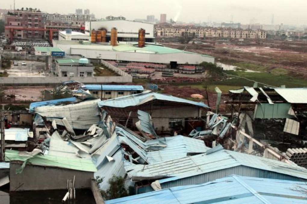 Hail and storms damaged buildings in Dongguan. Photo: Xinhua