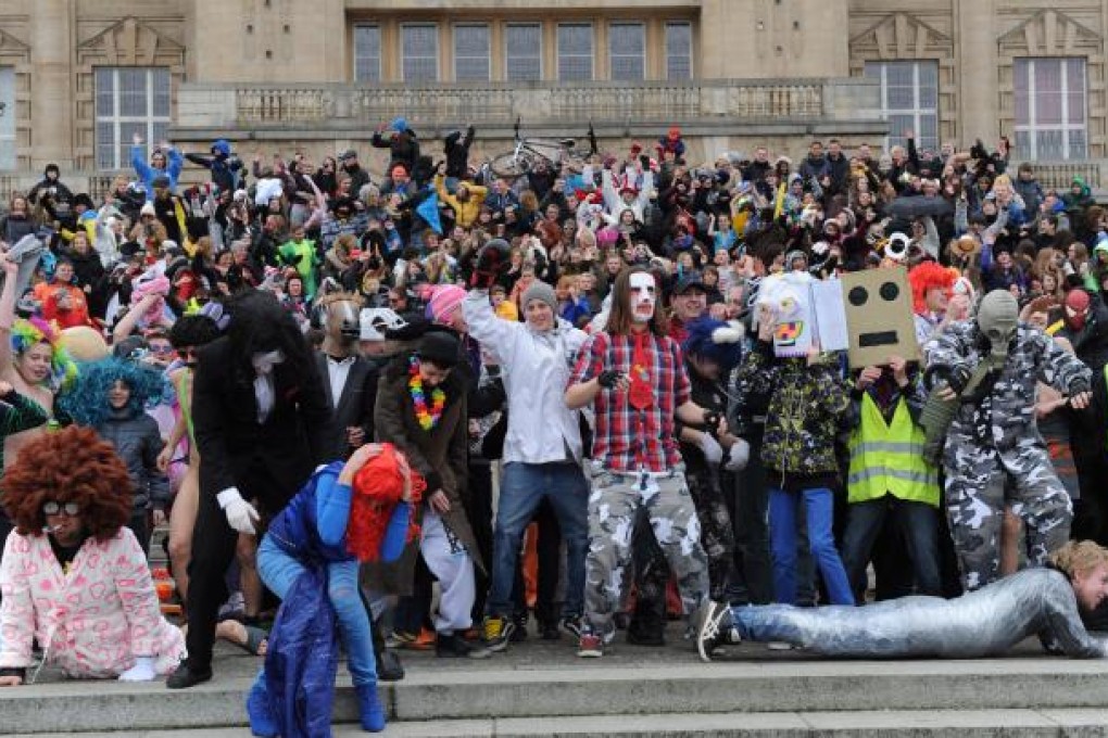 People in fancy dress perform the Harlem Shake dance in Szczecin, Poland on March 9, 2013. Photo: EPA