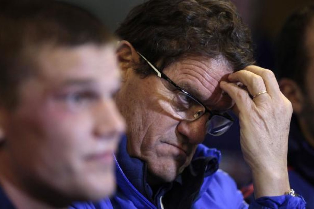 Fabio Capello says he's staying with the Russia team. Photo: AP