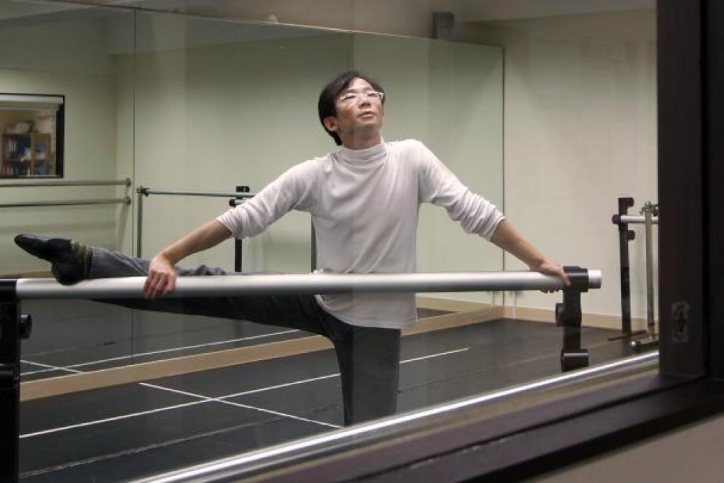 So Hon-wah at the barre in his Youth Ballet of Asia studio housed within an old North Point factory building. Photo: Jonathan Wong