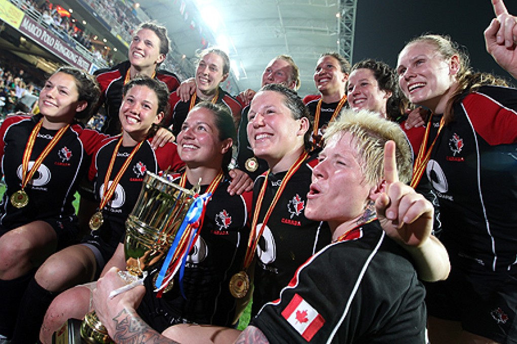Women's Cup Final winners Canada celebrate after thrashing Australia 29-0. Photo: Felix Wong