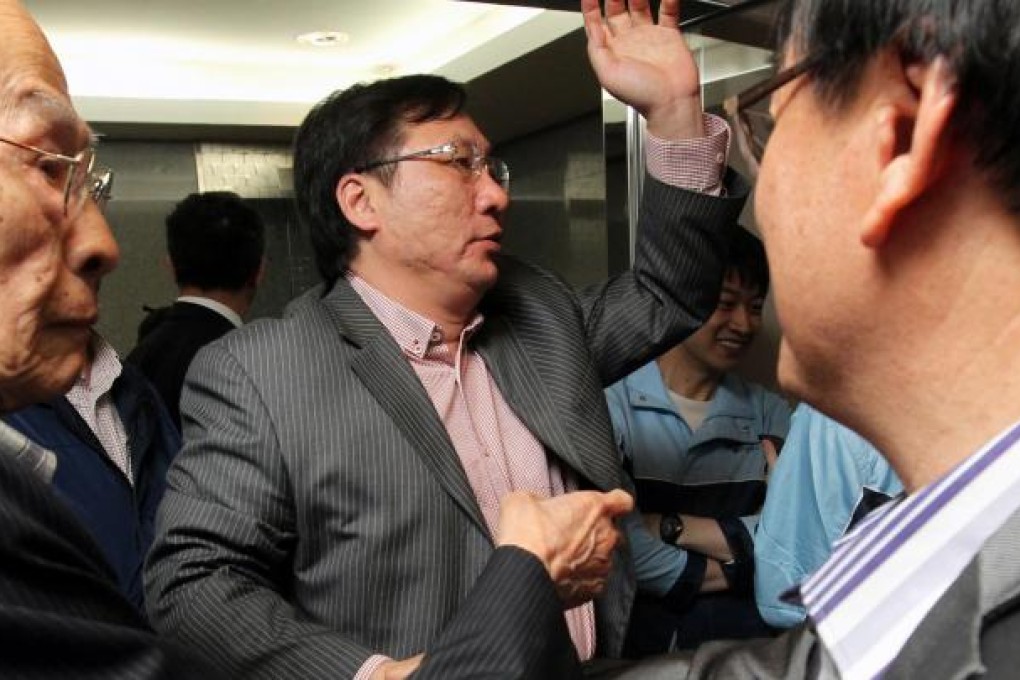 Former councillor Edward Leung holds a press conference after the High Court ruled he was unduly elected in 2011. Photo: May Tse