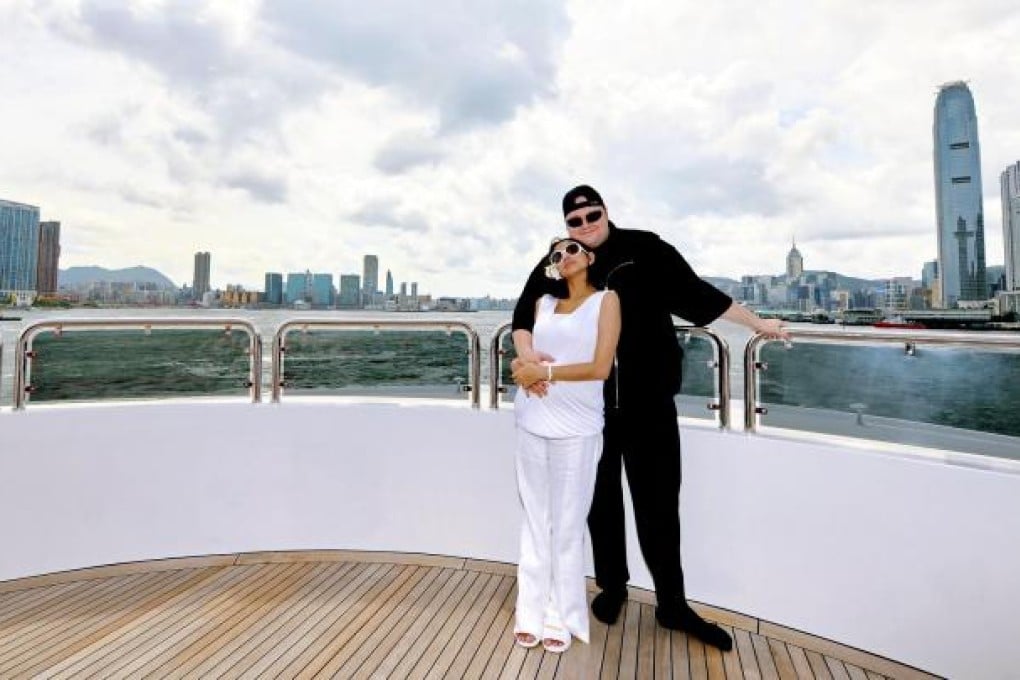 Kim Dotcom with his wife, Mona Verga, in Victoria Harbour. The couple met in Manila, after he moved to Hong Kong in 2003. Photo: Kim.com