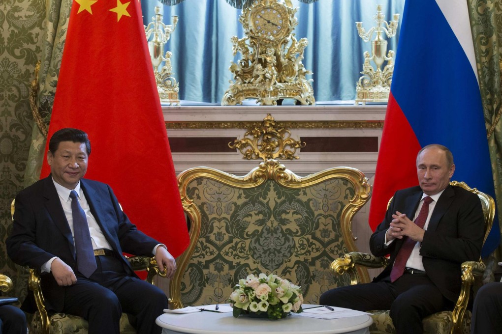 Xi with President Vladimir Putin at the Kremlin. Photo: Reuters