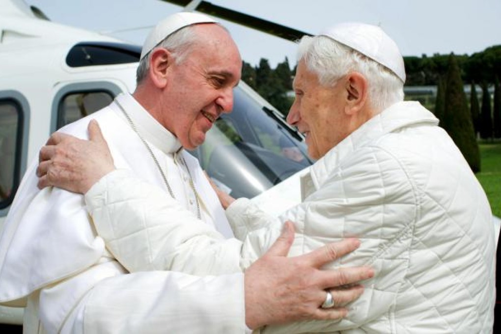 Pope Francis (left) yesterday embraces Benedict at Castel Gandolfo in Italy, where the latter lives in seclusion. Photo: AP