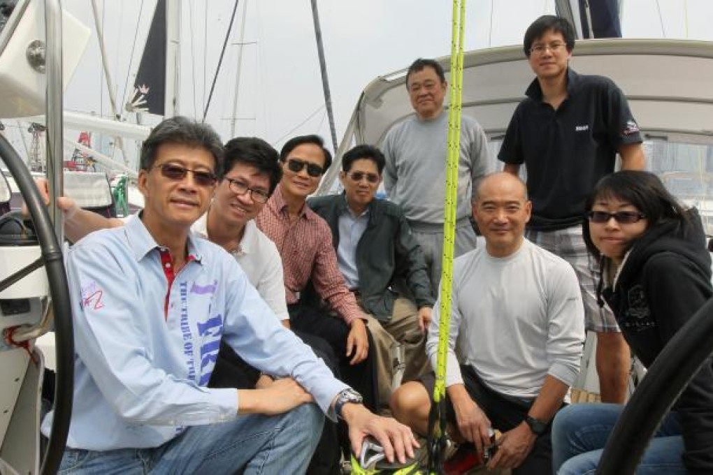 Leon Chan (left) and crew members are ready to plunge back into international waters with their new vessel Tipsy Easy, successor to the ill-fated Tipsy Frenz which sank last year. Photo: K.Y. Cheng