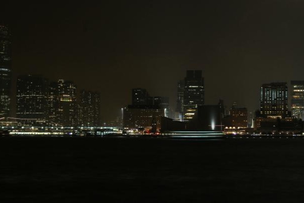 Hong Kong Cultural Centre and most buildings of their lights switched off during Earth Hour in Victoria Harbour last year. Photo: Dickson Lee