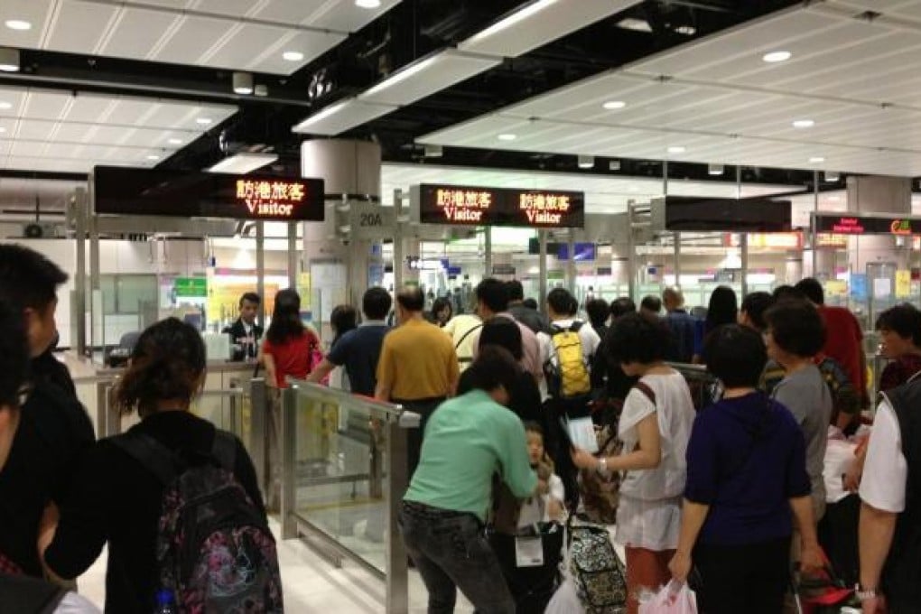 A picture taken by mainland resident Su Jia on March 20 shows passengers queueing in front of immigration counters at Lo Ma Chau checkpoint. Photo: SCMP Pictures