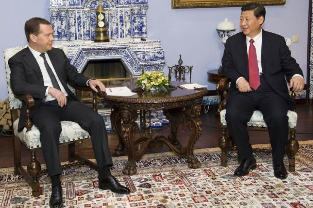 Chinese President Xi Jinping meets with Russia's Prime Minister Dmitry Medvedev in Moscow. Photo: Xinhua
