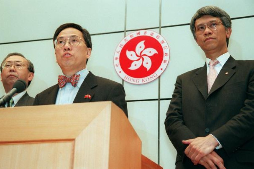 A day in history: Rafael Hui, Donald Tsang, and Joseph Yam announce a huge share-market intervention on August 14, 1998.