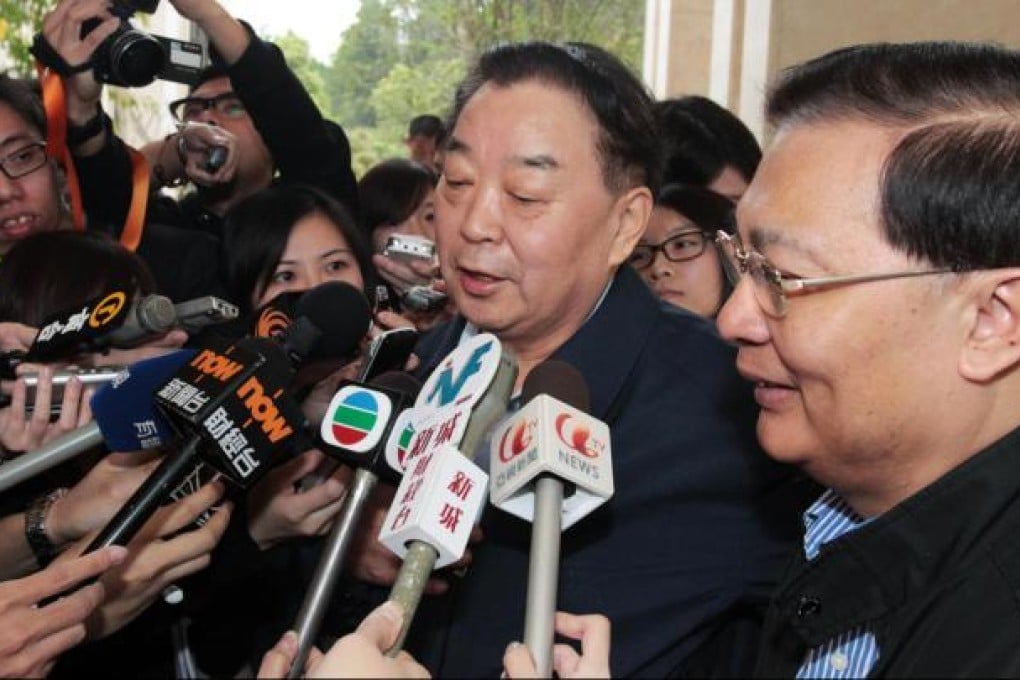 Qiao Xiaoyang, chairman of the Law Committee under the National People's Congress Standing Committee, speaks to reporters at yesterday's NPC seminar in Shenzhen. Qiao insisted Beijing had shown maximum tolerance to the city's dissident parties. Photo: SCMP