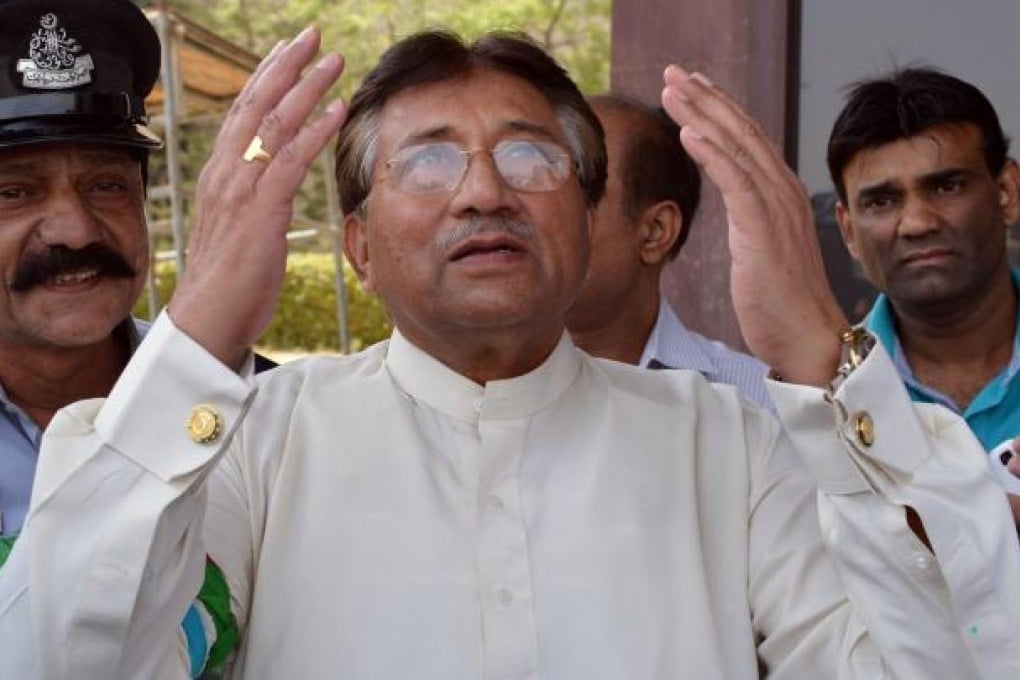 Pervez Musharraf prays after arriving at Karachi airport to mount his campaign for the May 11 general election. Photo: AFP