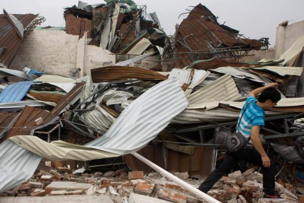 Debris from a flattened factory in Dongguan. Photo: AFP