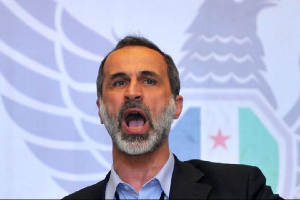 Ahmed Moaz al-Khatib quit as the coalition head. Photo: AFP