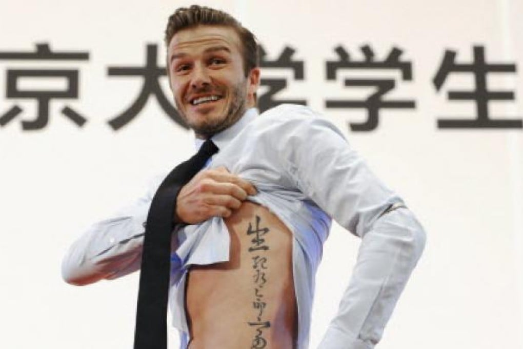 The original photo of Beckham revealing his Chinese tattoo. Photo: Reuters