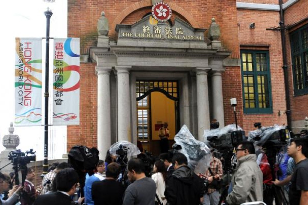 The Court of Final Appeal dismissed an appeal by Filipino helpers seeking permanent residency in the city. It also denied the HKSAR government's request for referring the right of abode issue to the NPC Standing Committee for clarification, saying the necessary conditions had not been met. Photo: Xinhua