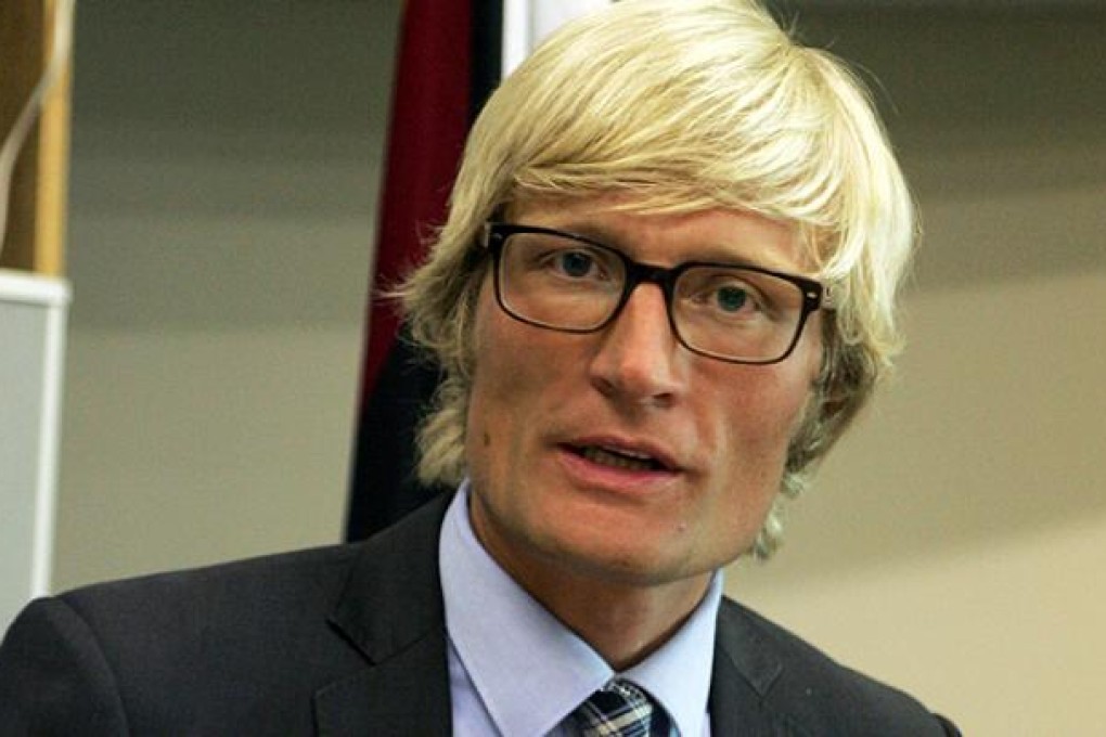 EU deputy ambassador to Zimbabwe Carl Skau announces the removal of 81 individuals and 5 entities from the EU sanctions list in Harare. Photo: AFP