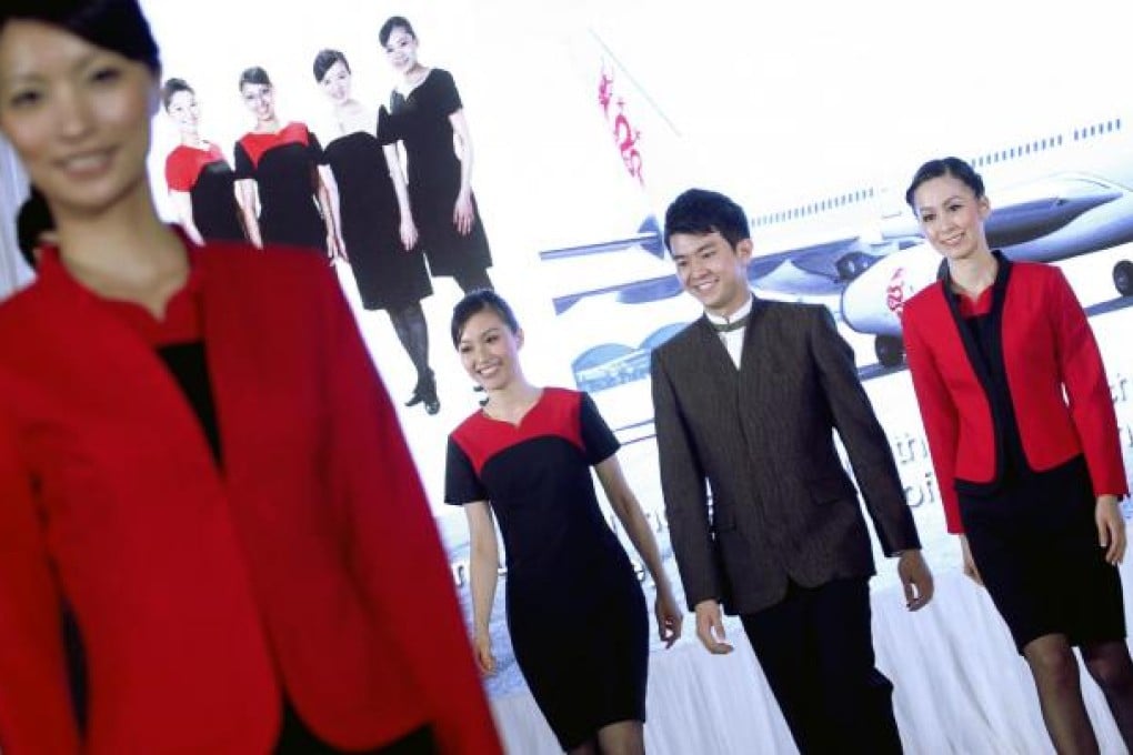 The dresses and jackets, showcased at The Peninsula, Tsim Sha Tsui, were designed to resemble Cathay Pacific's dress code. Photo: Felix Wong