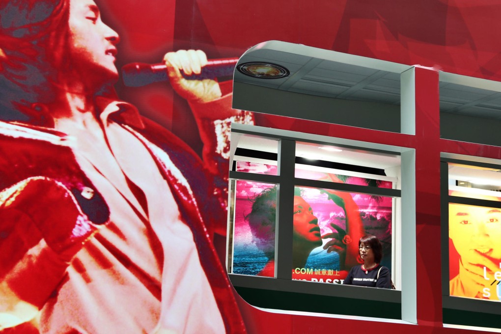 A variety of Leslie Cheung's posters and record covers on display at the Olympian City mall in Kowloon to commemorate the 10th year since his death. Photo: Sam Tsang