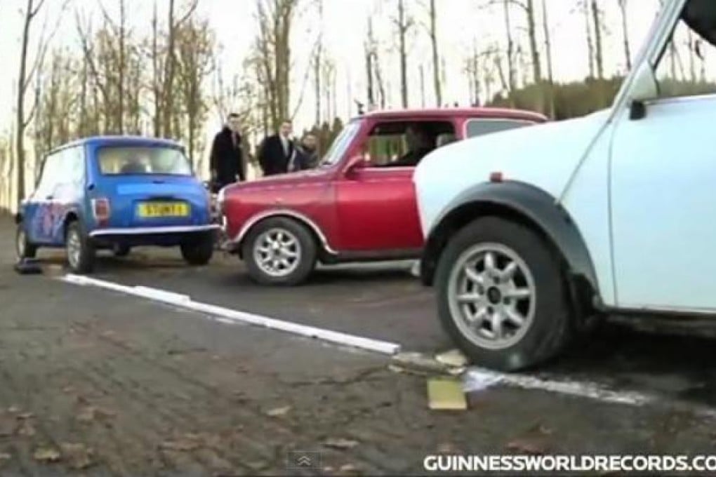 The Guinness World Record for tightest parallel parking is broken in a screen grab from the video