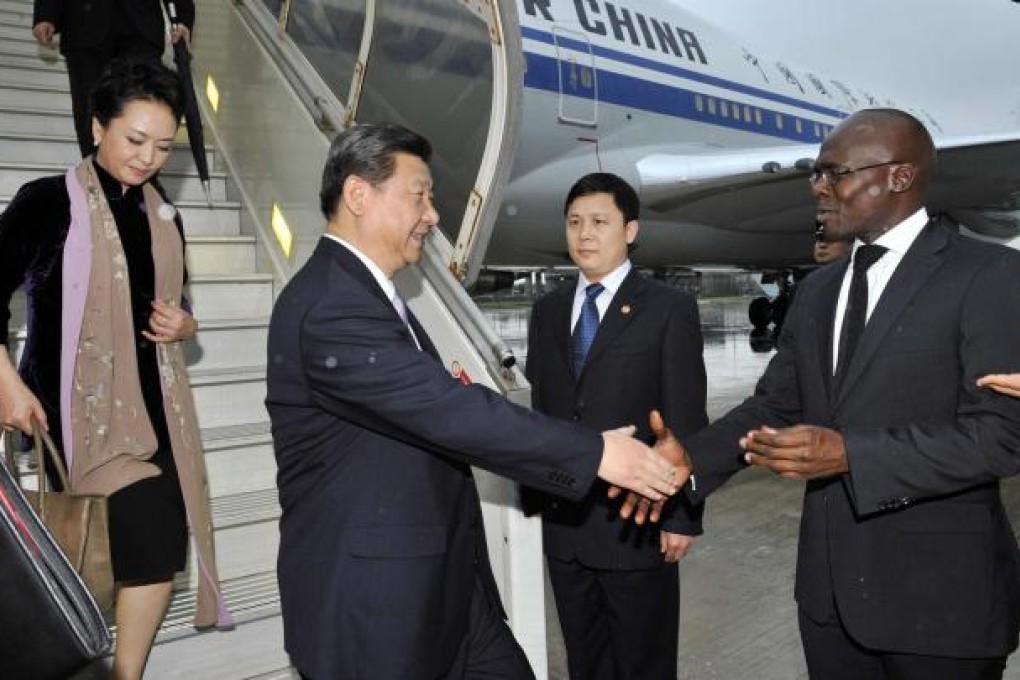 President Xi Jinping arrives in Durban, South Africa, on a trip that also took him to Tanzania and the Republic of Congo. Photo: EPA