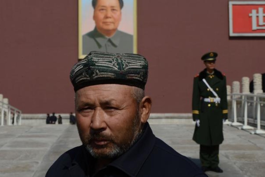 A Uighur from Xinjiang on Tian'anmen Square in Beijing on March 3, 2013. (Photo: AFP)