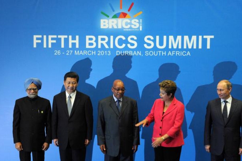 BRICS leaders (from left): India Prime minister Manmohan Singh, President of the People's Republic of China Xi Jinping, South Africa's President Jacob Zuma, Brazil's President Dilma Rousseff and Russian Federation President Vladimir Putin. Leaders from the BRICS group of emerging powers failed to launch a much-anticipated new development bank to rival Western-dominated institutions like the World Bank. Photo: AFP