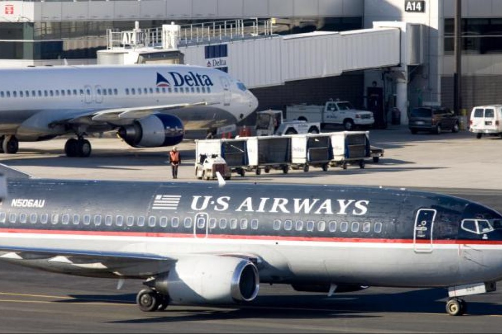 Airlines such as US Airways and Delta are rated higher on average by analysts than 92 per cent of US companies. Photo: Bloomberg