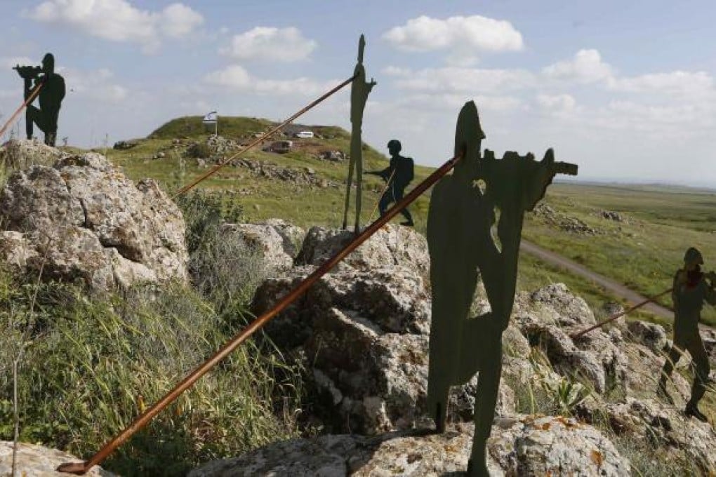 Sculptures on a hill in the Israeli-occupied Golan Heights near the Israeli-Syrian border, where the 20,000-strong native Druze people remain loyal to Damascus. Photo: Reuters