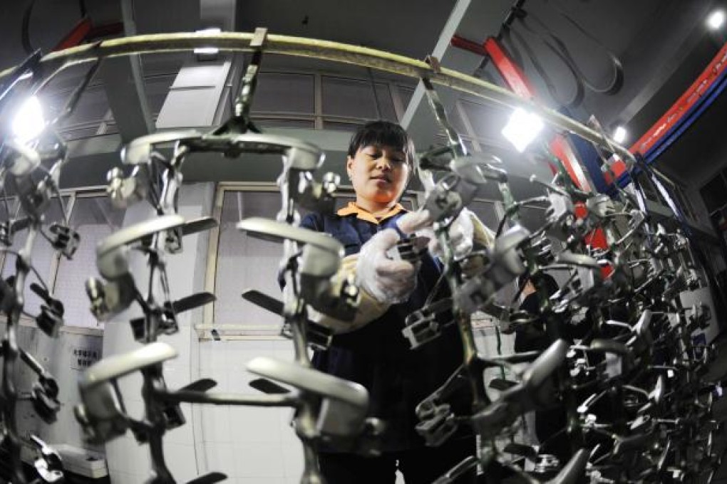 China's official purchasing managers’ index (PMI) hit 50.9 in March, the highest since April last year when the figure stood at 53.3. Photo: Xinhua