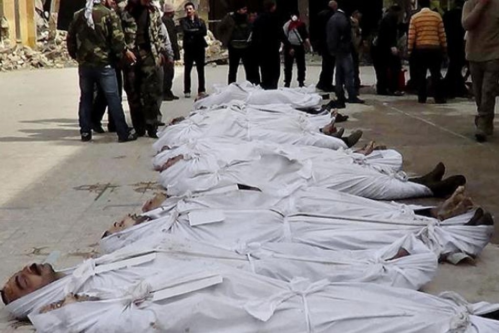 Bodies pulled from the river in Aleppo's Bustan al-Qasr suburb. Photo: AP