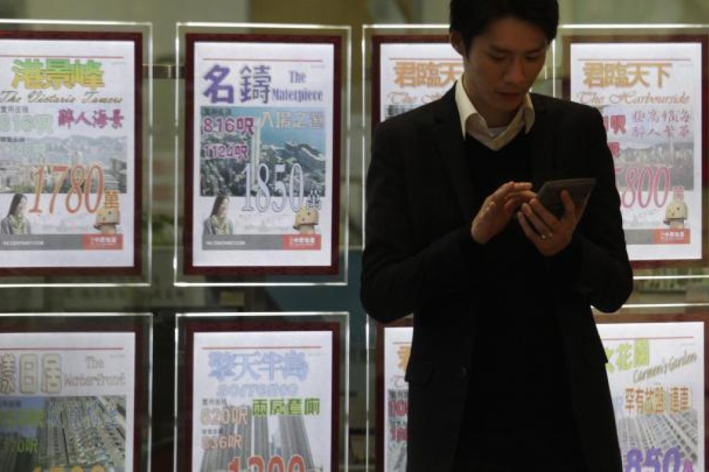 Investors in the high end of the property market may need to take deeper cuts to book profit, one research report says. Photo: Reuters