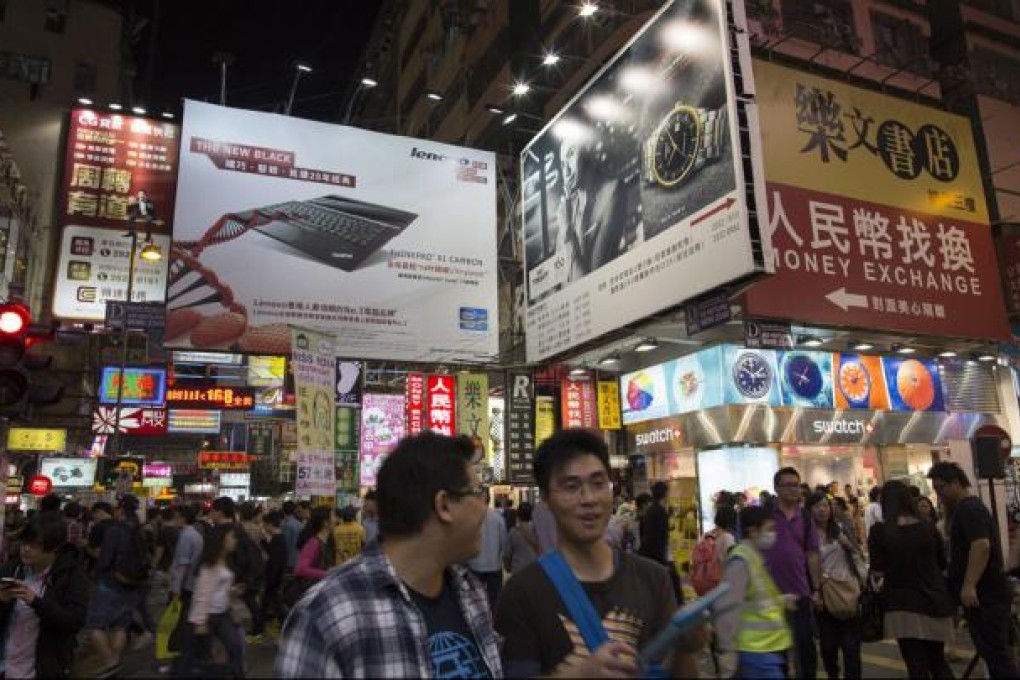 Giant illuminated billboards and electric signboards in Hong Kong. Photo: EPA