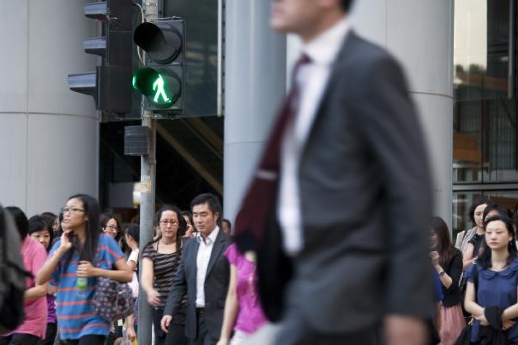 The Mandatory Provident Fund, covering 2.5 million employees in the city, has recorded two consecutive months of losses. Photo: Bloomberg
