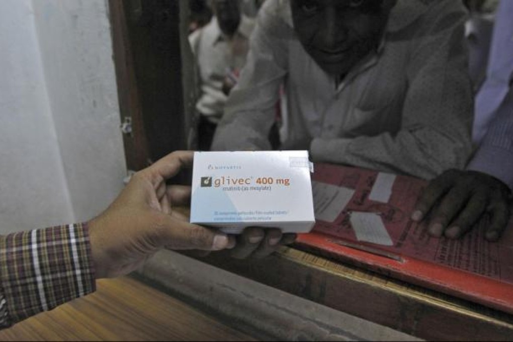 A man buys cancer drug Glivec at a pharmacy in a government-run hospital. Photo: Reuters