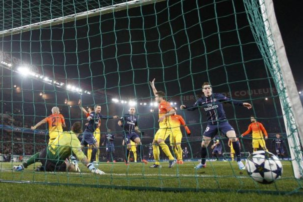 PSG's Zlatan Ibrahimovic scores in their Champions League quarter-final, first leg against Barcelona at Parc des Princes. Photo: Reuters