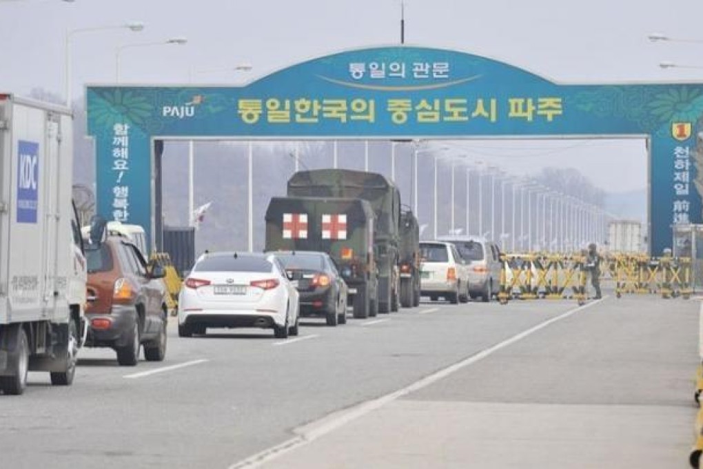 Vehicles at a South Korean military checkpoint on the road to the Kaesong Industrial complex across the border in North Korea. Photo: AFP