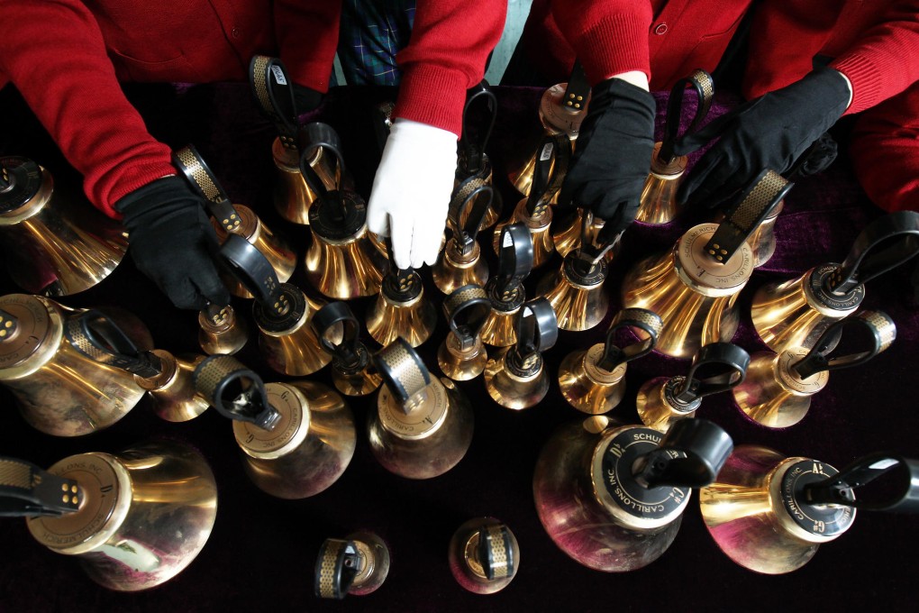 The primary school's handbell programme was started by Kenyon Law to give students confidence. Photo: Dickson Lee