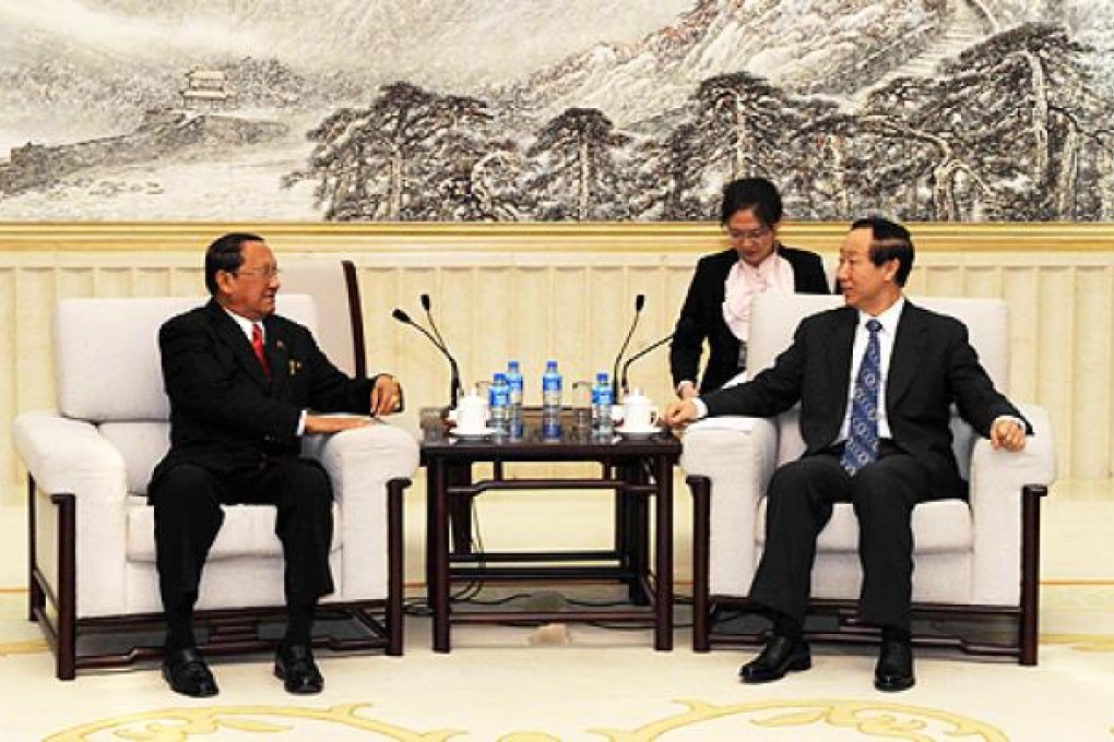Wang Jiarui (right), head of the International Department of the Communist Party of China Central Committee, meets with Thura U Aye Myint, vice chairman of the Union Solidarity and Development Party of Myanmar, in Beijing, on Wednesday. Photo: Xinhua
