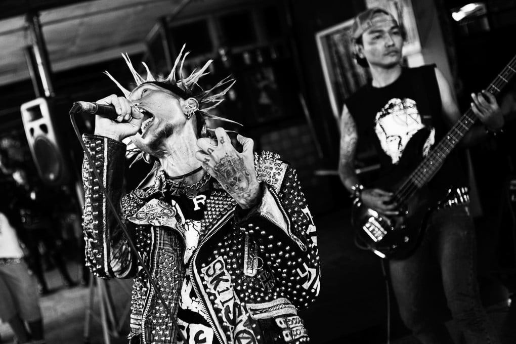 Myanmese punk rocker Scum gives it his all. Photo: Matt Grace