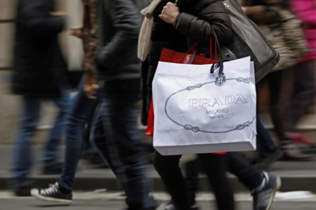 Prada's sales of luxury goods continued to enjoy healthy growth in the Asia-Pacific region last year, where revenues increased by 32.9 per cent to €1.16 billion. Photo: Bloomberg