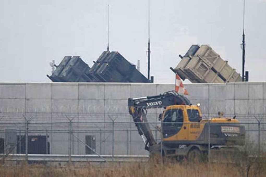 A truck moves past US Army Patriot missile air defence artillery batteries at US Osan air base in Osan, south of Seoul, on Friday. Photo: Reuters