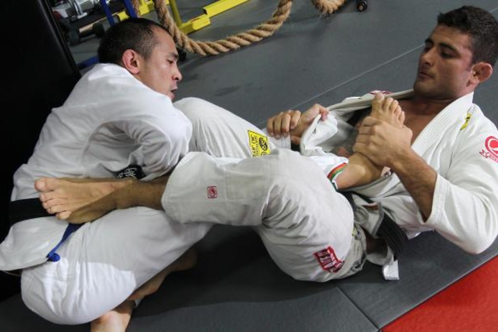 Erick Buthsombat and Rodrigo Caporal in training at the JAB MMA gym in Central. Photo: David Wong