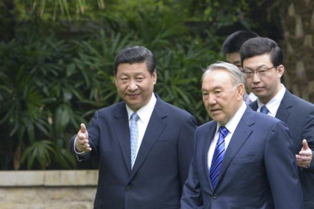 President Xi Jinping welcomes Kazakh President Nursultan Nazarbayev. Photo: Xinhua