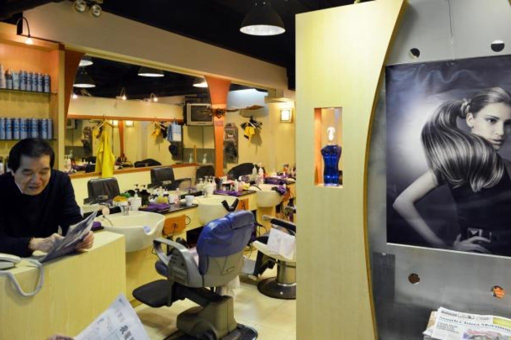 Talianna, in Central, is one of the oldest barbershops in Hong Kong, and offers a shave and a haircut for HK$400 - or just HK$200 for each. Photo: Thomas Yau